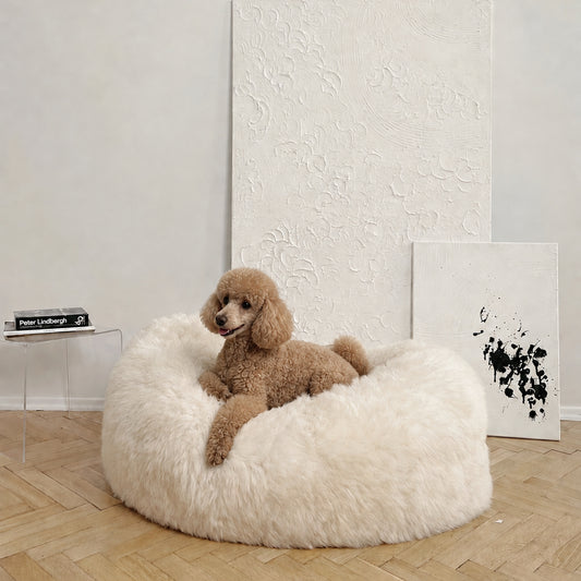 The Tatra Natural Sheepskin Pouf Bed – White / Ivory